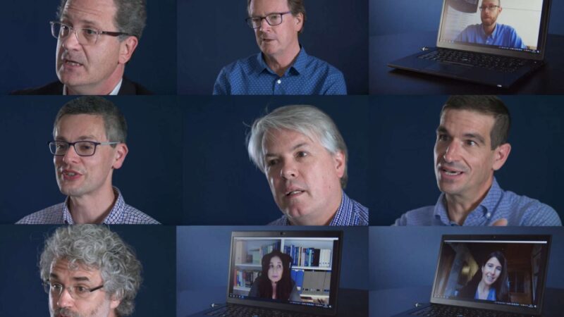 Headshots of white men and one white woman as stills in a grid on a dark blue background.